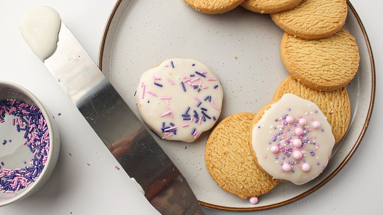 frosted sugar cookies on plate