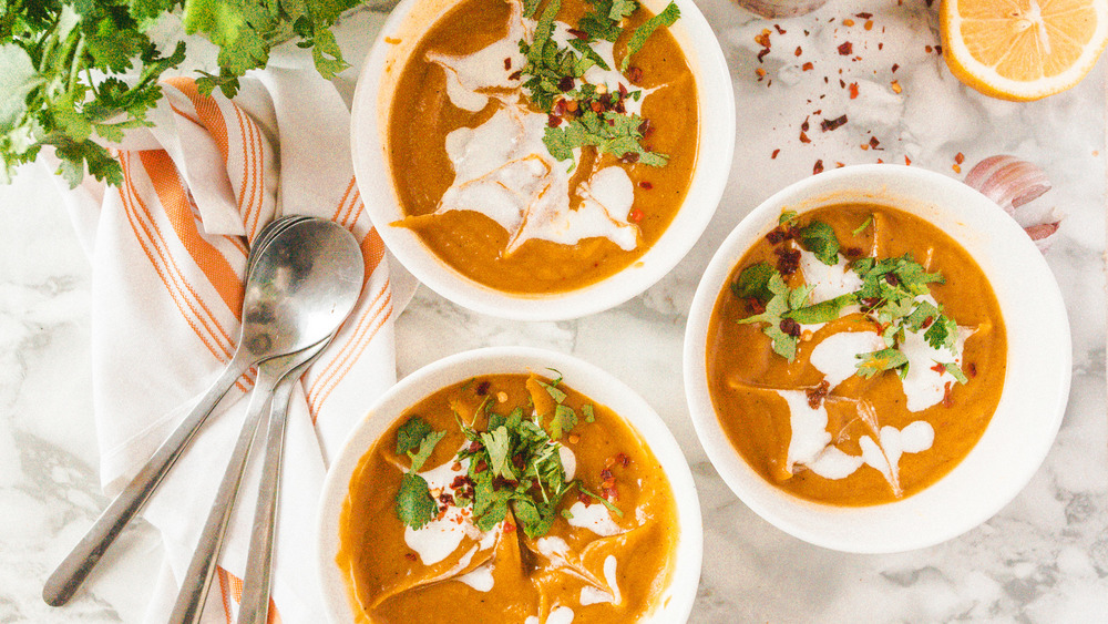 three bowls of butternut squash soup