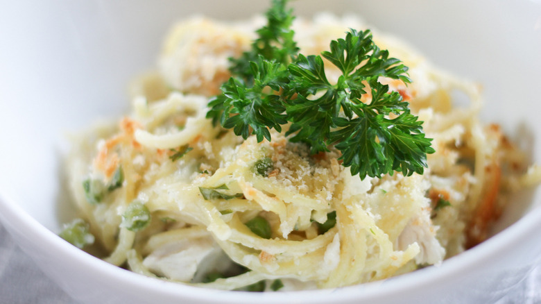 Easy Turkey Tetrazzini in bowl with parsley garnish