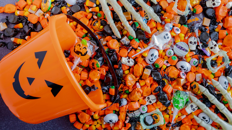 Orange Halloween pail and candy