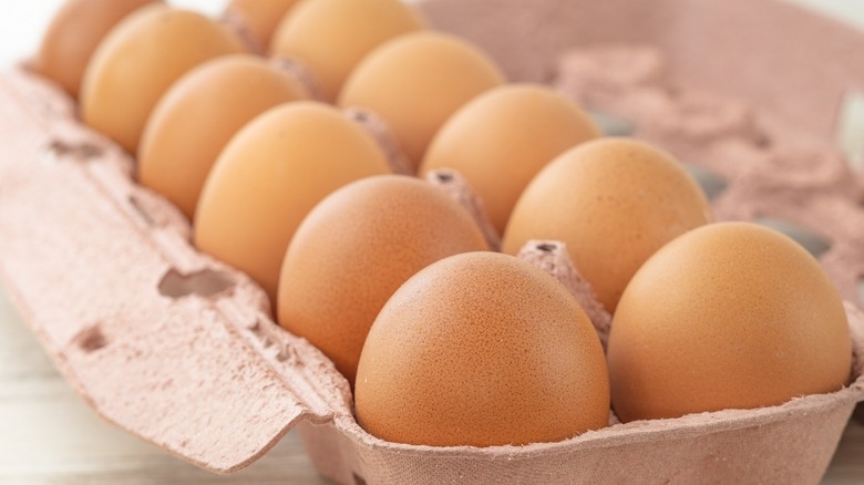Carton of brown eggs 