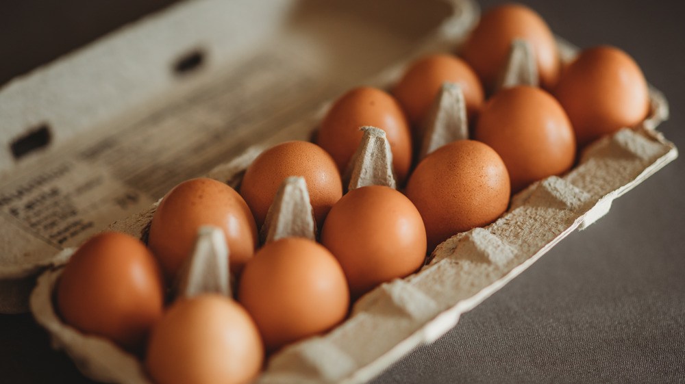 Carton of brown eggs