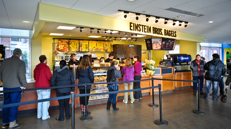 Customers line up for Einstein Bros. Bagels