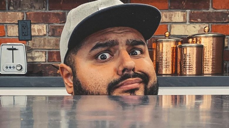 El Guzii at kitchen counter 