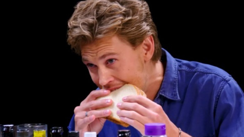Austin Butler eating a peanut butter and jelly sandwich on "Hot Ones"