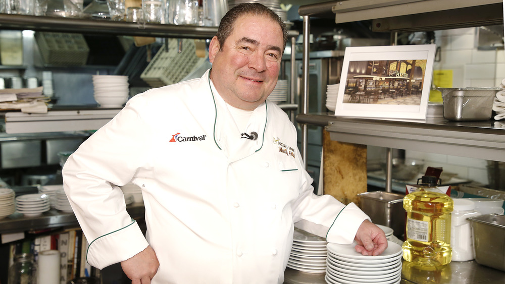 Emeril Lagasse  smiling and posing