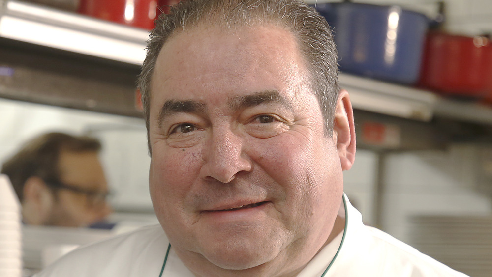 Emeril Lagasse slightly smiling