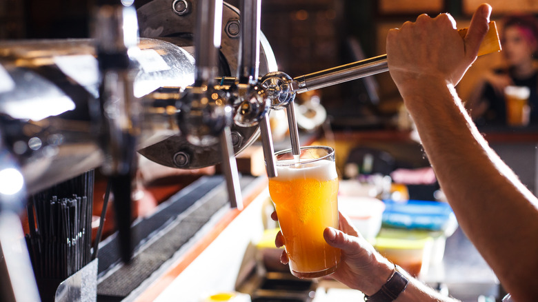 Bartender pouring beer