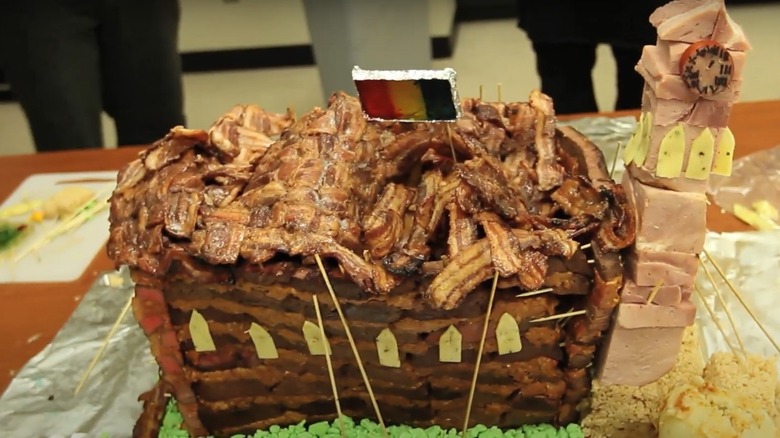 A still from the meat building 101 episode of Epic Meal Time.