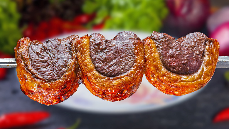 picanha steak slices on skewer 