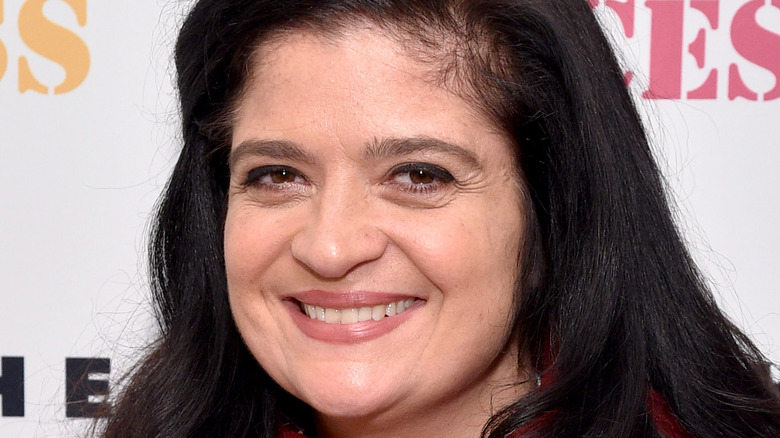 Alex Guarnaschelli wearing a red sweater 