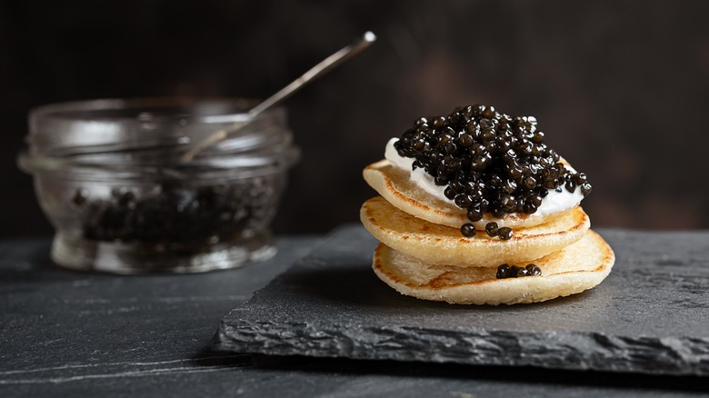 Caviar over a stack of blinis