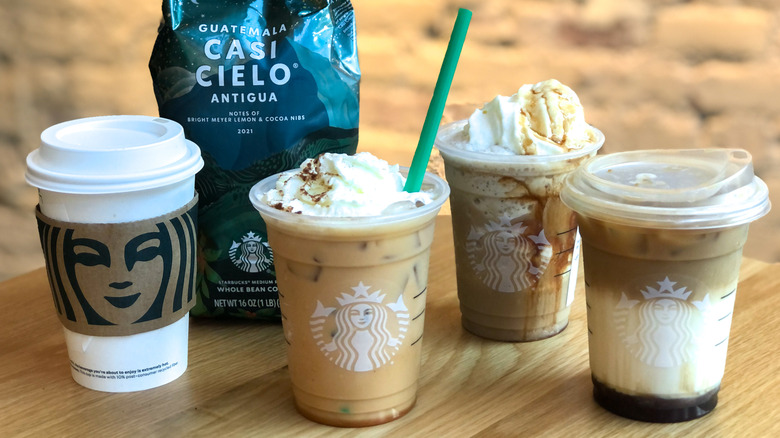 Collection of Starbucks fall 2021 drinks pumpkin spice latte and apple crisp macchiato