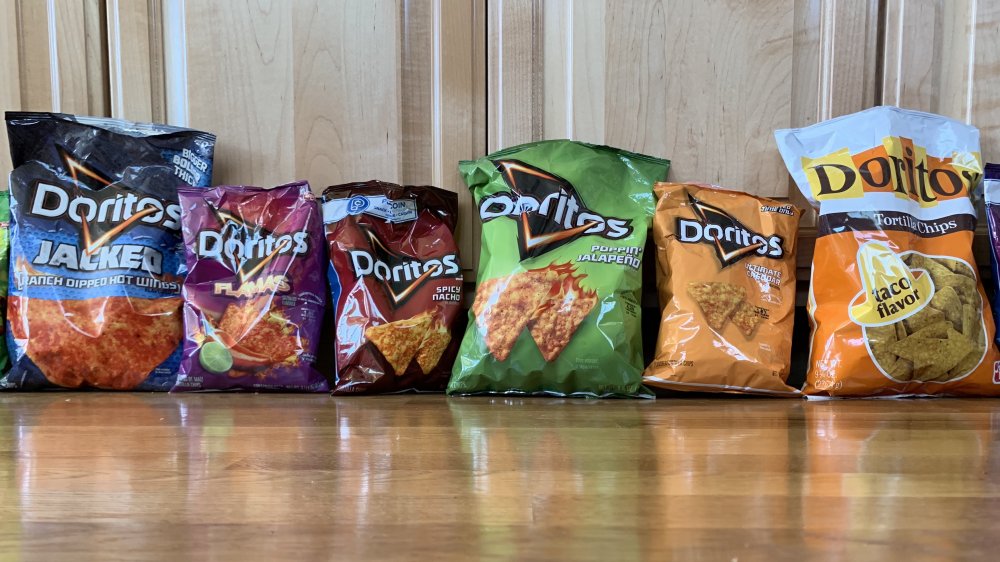 multiple open bags of Doritos