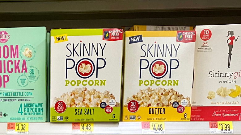 Two boxes of SkinnyPop popcorn on a shelf