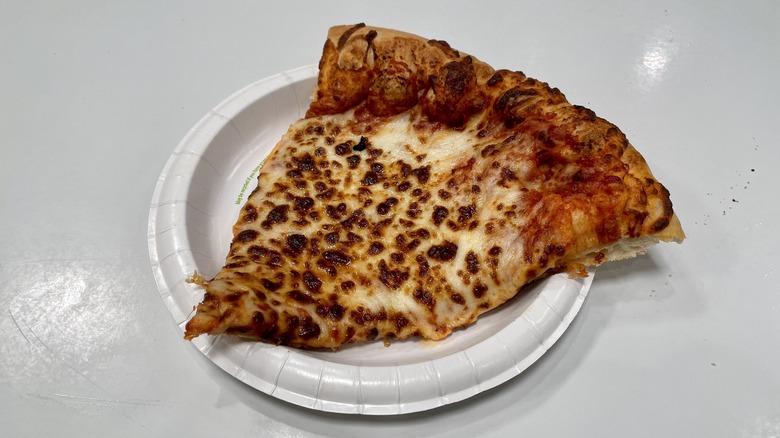 Costco cheese pizza on paper plate