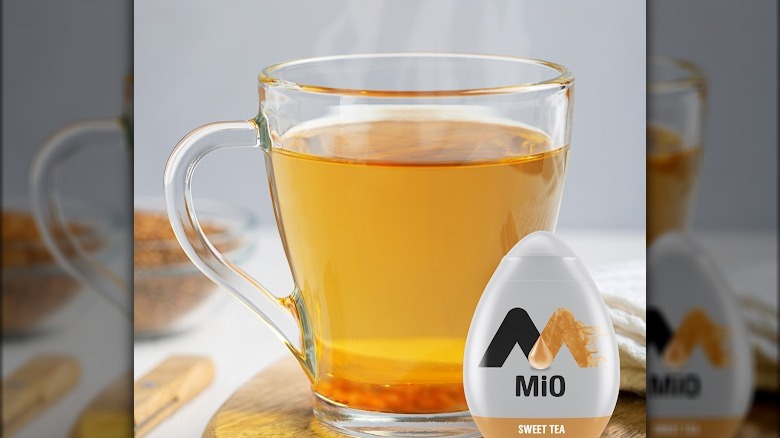 MiO Sweet Tea water enhancer next to mug of tea