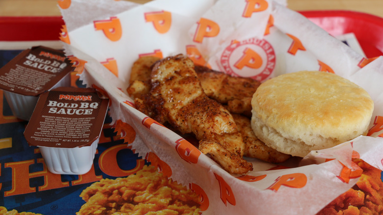 Popeyes meal with chicken, biscuit, and BoldBQ sauce