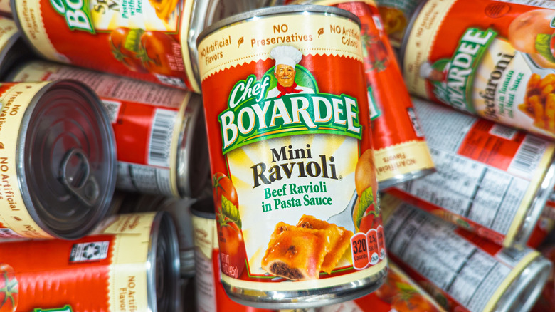 pile of Chef Boyardee cans