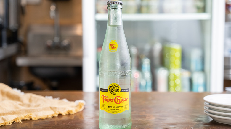 Bottle of Topo Chico on kitchen counter