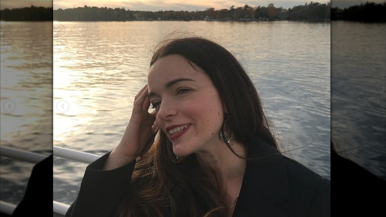 Trish Spencer in front of lake