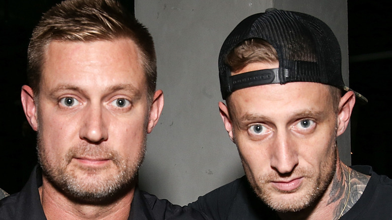 Bryan and Michael Voltaggio staring at camera