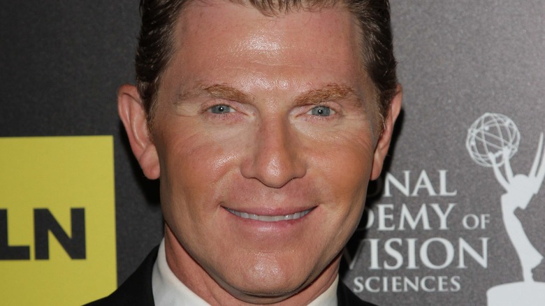 Bobby Flay smiling at event 