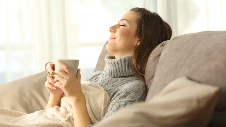 woman relaxing with coffee mug