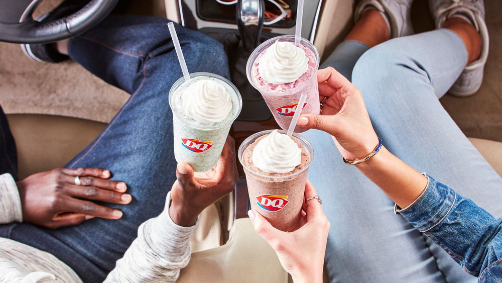 Hands holding new Dairy Queen chip shakes