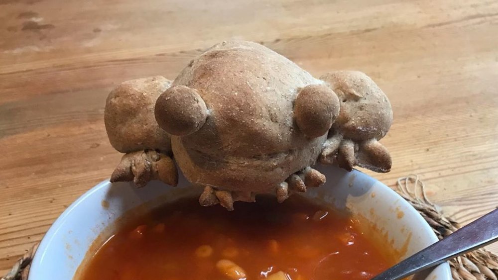 Frog bread watching over a bowl of soup