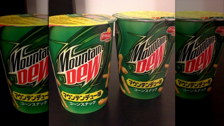 Green plastic cups with Mountain Dew Cheetos