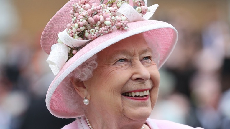 Queen Elizabeth in pink hat