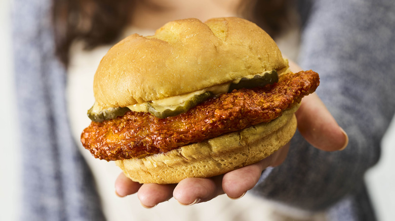 Smashburger Scorchin' Hot Crispy Chicken Sandwich in hand