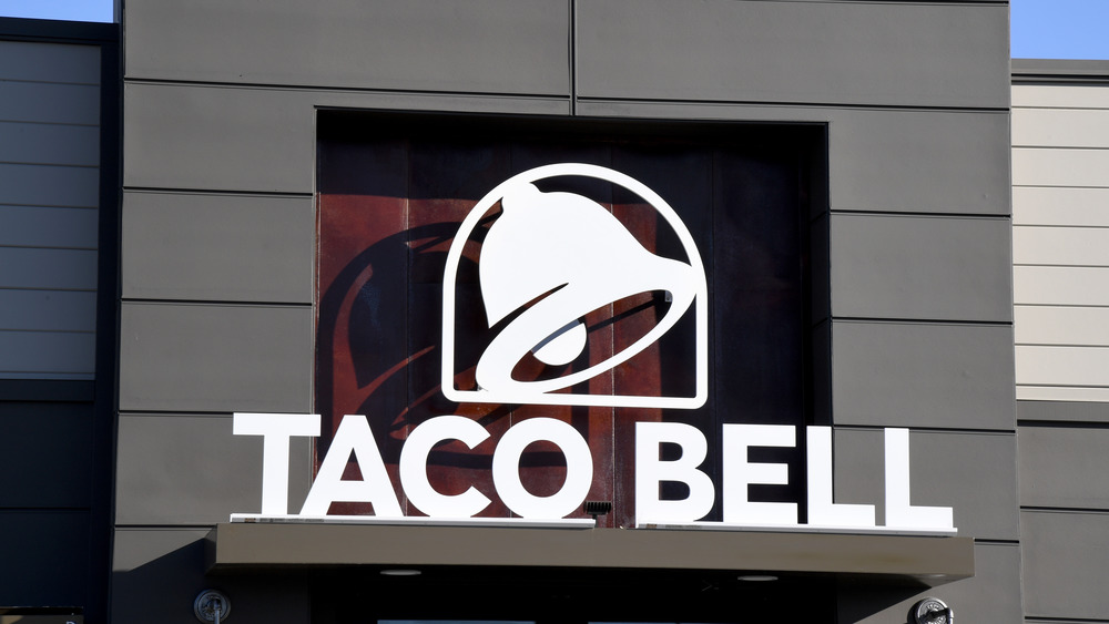 Taco Bell sign on outside of restaurant 