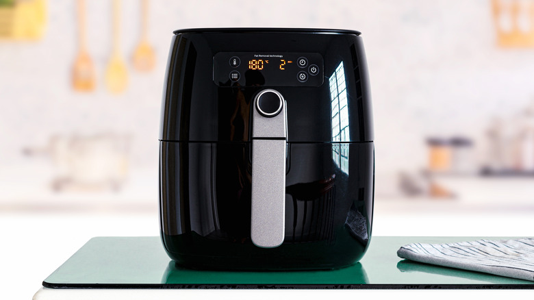 Black air fryer on counter