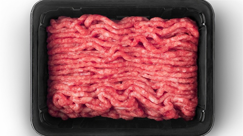 Ground beef in plastic container
