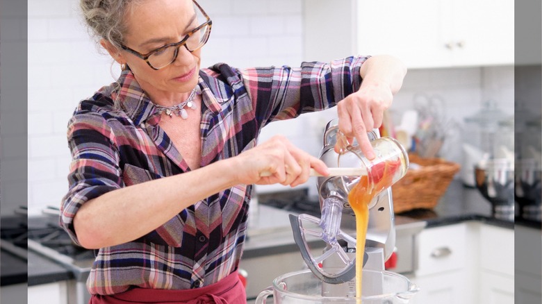 Zoë François mixing ingredients in kitchen