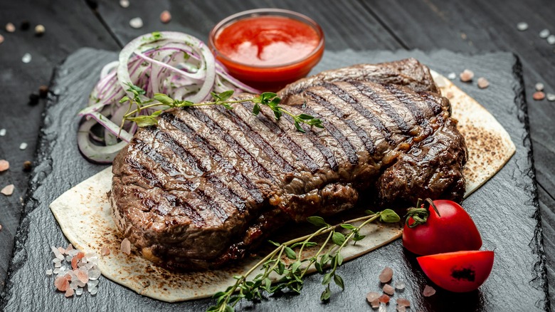 Grilled ribeye on slate