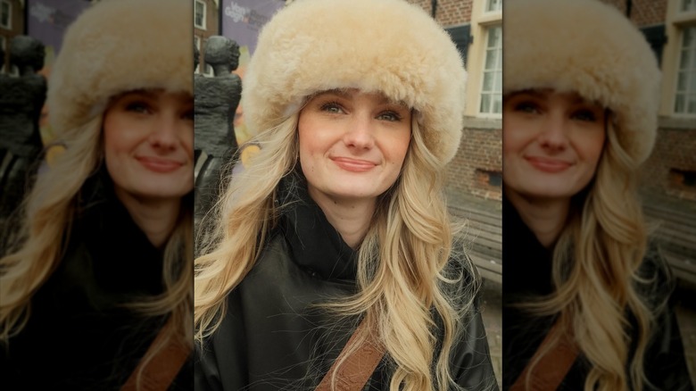 Tini Younger takes a selfie outside with a winter hat on