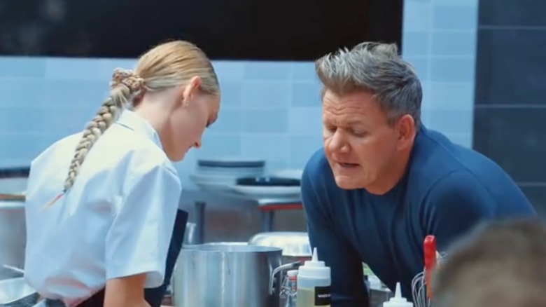 Tineke Younger having a conversation with Gordon Ramsay in a scene from the series Next Level Chef