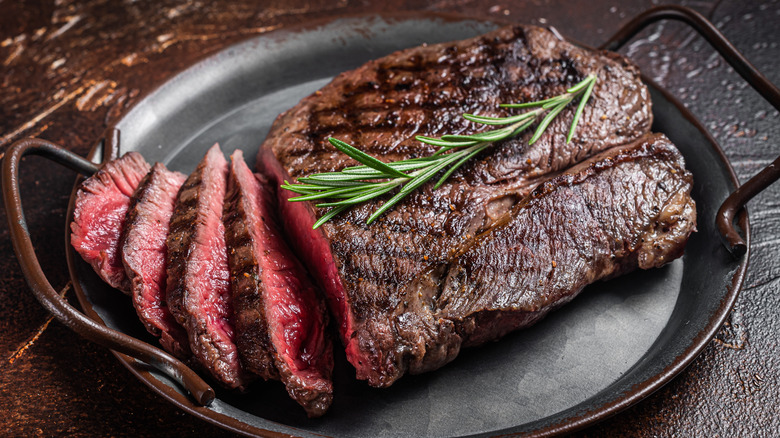 Sliced steak on pan