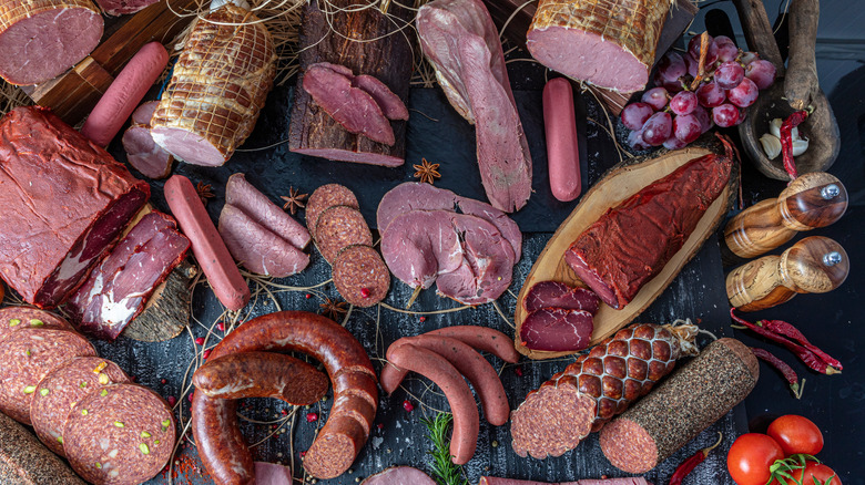 spread of different kind of meats on a table