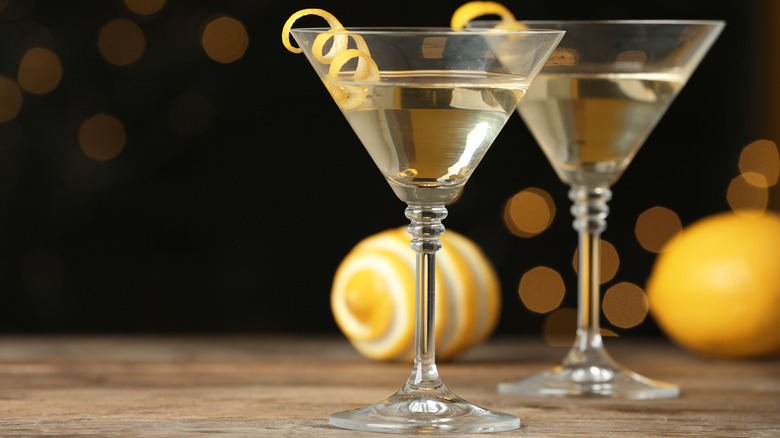 Two gin martinis on wood