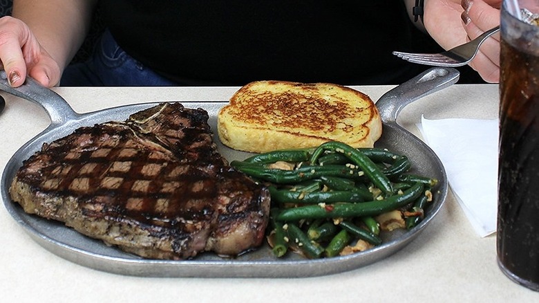 Steak on skillet plate