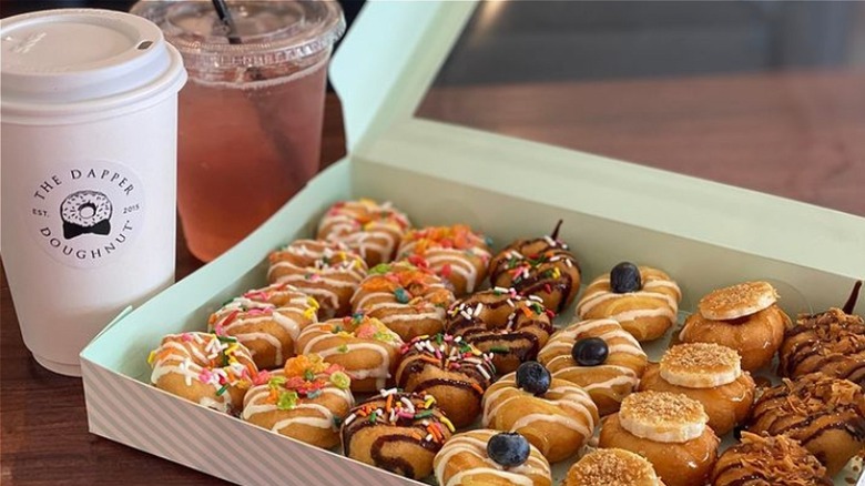 The Dapper Doughnut box of donuts and coffee