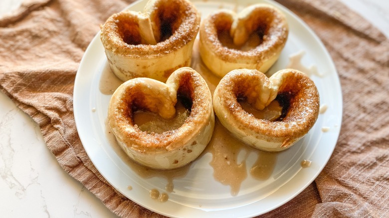 Four cinnamon roll hearts