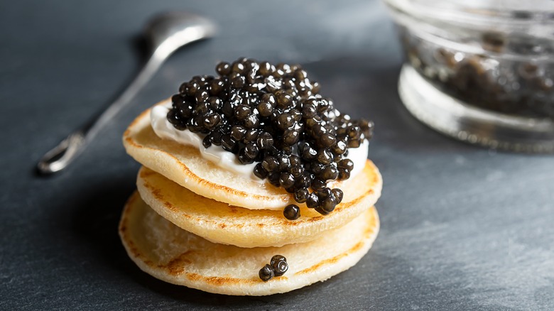 Caviar on blini pancakes