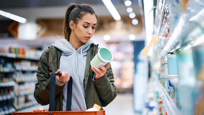 lady reading a food label