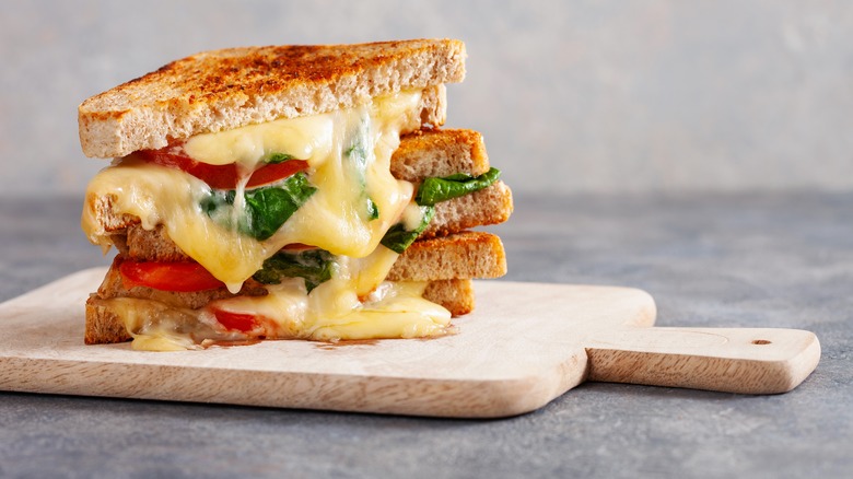 grilled cheese on wooden board