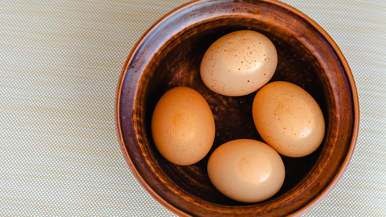 Eggs in bowl of water 